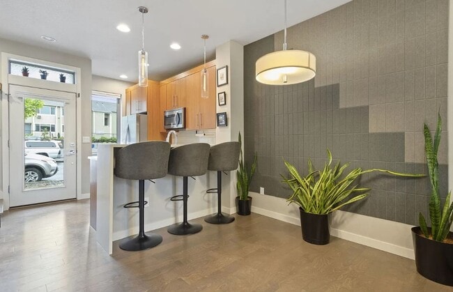 Building Photo - Dual Masters! Stunning Modern End-Unit Townhome in Buckman Bright, Airy & Designed for Comfort