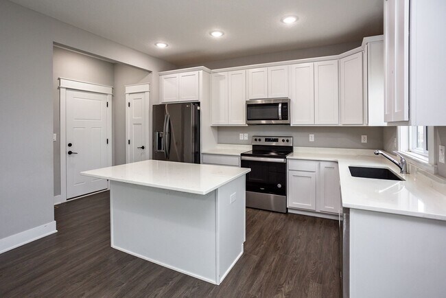 Building Photo - Like-New 4-Bedroom Home in Heritage Park –...