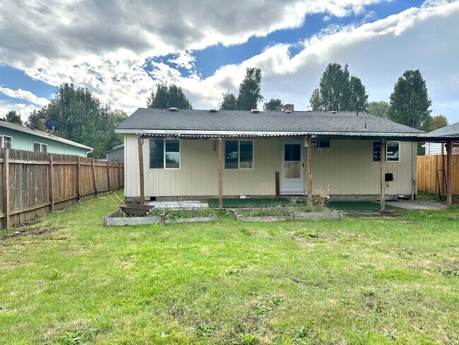 Building Photo - Three bedroom home with large fenced yard