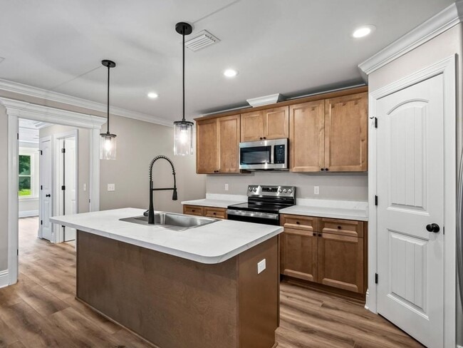 Building Photo - Your Family’s New Happy Place Available Today