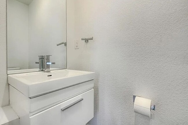 Building Photo - Modern LoHi Living with Rooftop Deck & City Views!!