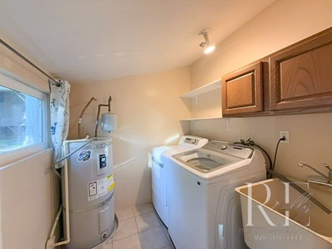 Building Photo - Waterfront Bliss: Stunning Puget Sound Views & Your Own Private Beach!