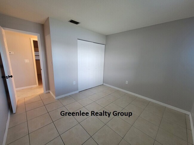 Building Photo - Relax by the water in this spacious 2-bedroom home with a 2-car garage, nestled in the highly des...