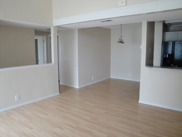 Building Photo - Open and Airy Condo at Country Club Villag...
