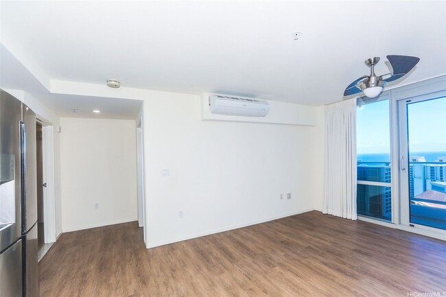 Building Photo - Priced Low to Sell!! Top floor with floor to ceiling windows to enhance the spectacular ocean