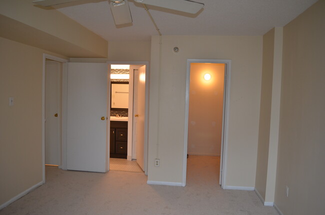 Bedroom with walk-in closet - 7401 Westlake Ter