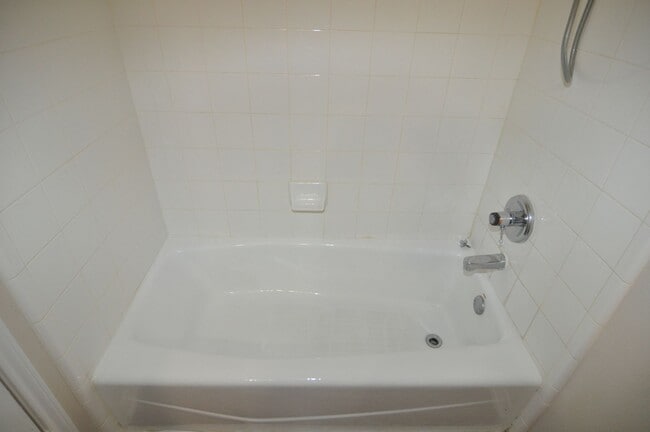 Building Photo - Welcome to this charming 3-2-2 brick home ...