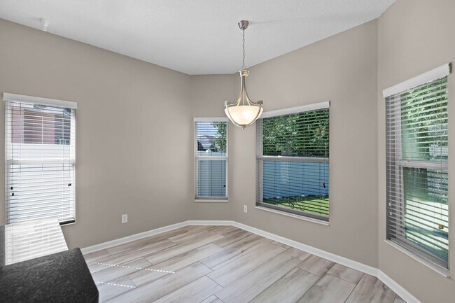 Building Photo - 4/2.5/2 Woodland Lakes Preserve Available Now
