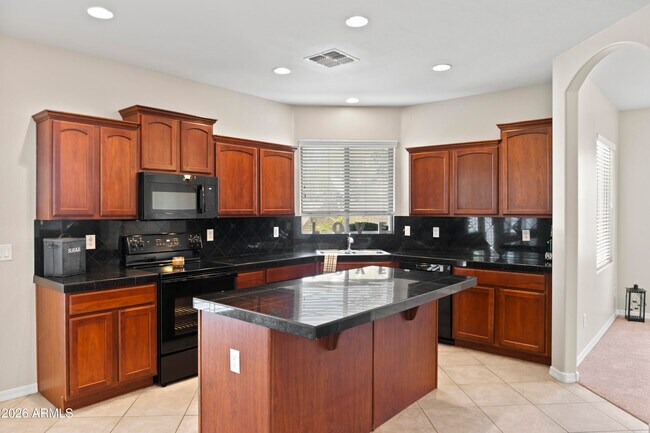 Building Photo - 13580 W Gelding Dr