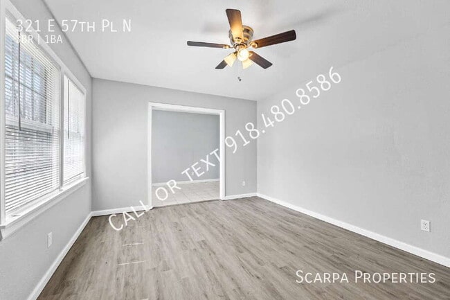 Building Photo - 321 E 57th Pl N