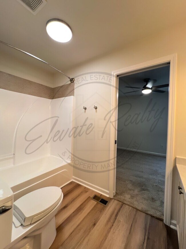 Building Photo - SPECIAL: FIRST MONTHS RENT FREE! Two Bedro...