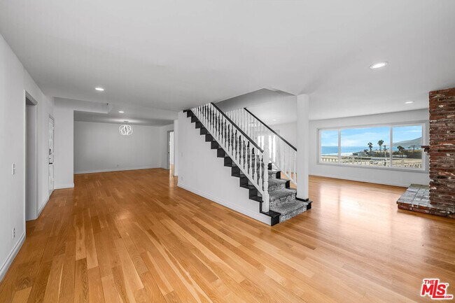 Building Photo - 6457 Surfside Way