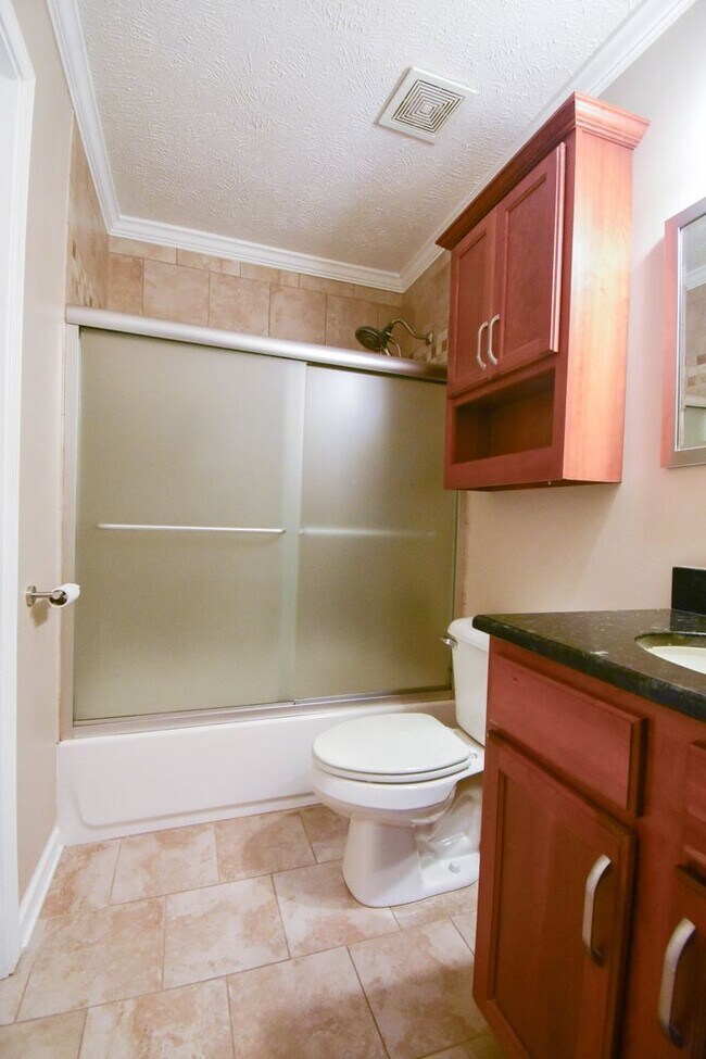 Building Photo - Coming Soon! 4 Bedroom 2.5 Bathroom With A Large Deck and 2 Car Garage! Near Methodist University