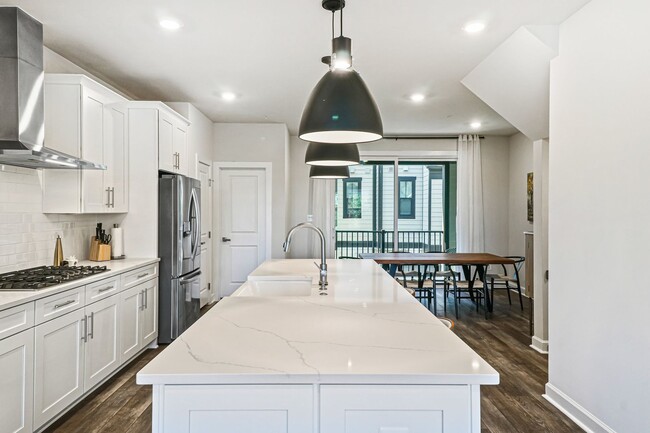 Building Photo - Your new home awaits you! Luxury Townhouse...