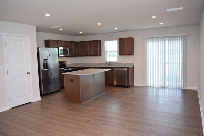 Building Photo - Modern 3-Bedroom Townhome in Desirable Bear Park