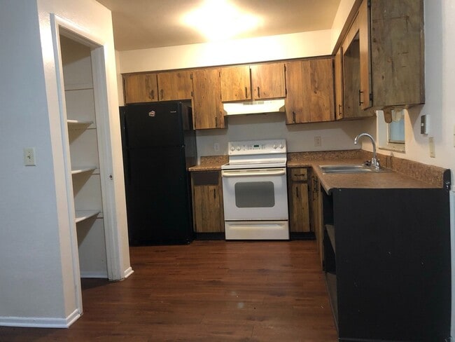 Building Photo - SPACIOUS 3BR/1.5BA w/Carport, Beautiful Wood Finish Flooring, Privacy Fenced Backyard! NO APP FEE!