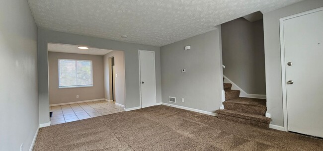 Building Photo - Cozy 2 bed 1 bath  townhouse with attached...