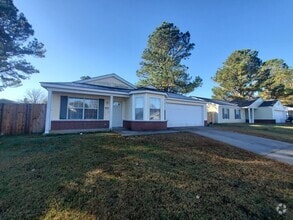 Building Photo - Nice 3 bedroom 2 bath home with fenced in ...