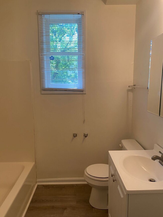 Building Photo - Updated three bedroom two bathroom home in...
