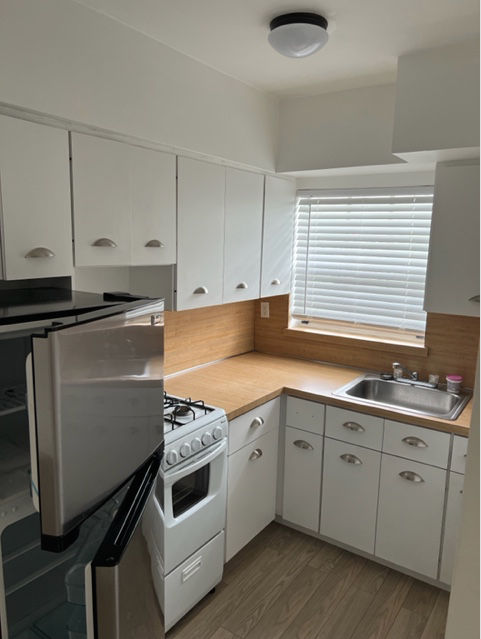 Kitchen with stainless refrigerator - 533 Coral Way