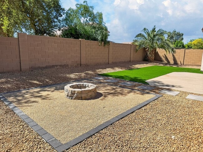 Building Photo - Single-level 4 bed, 2 bath home with tandem 3-car garage and RV gate.