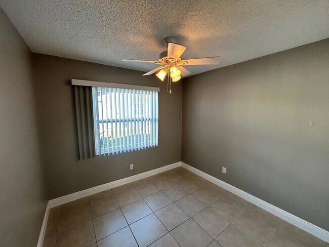 Building Photo - 6525 Manila Palm Way