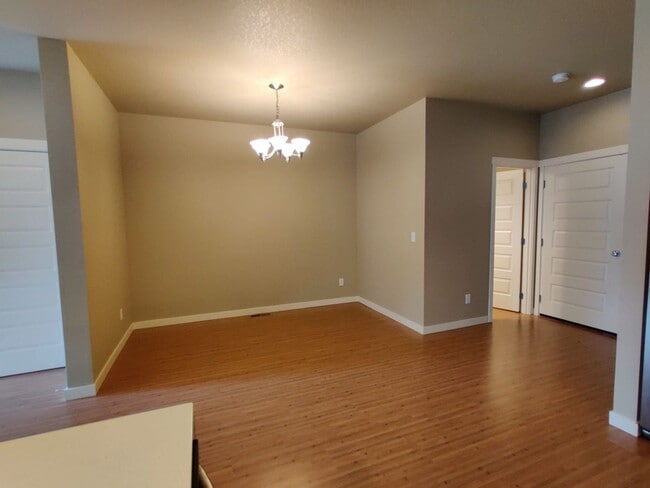 Building Photo - Modern Hawks Prairie Townhome