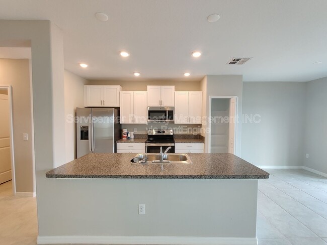 Building Photo - 7412 French Marigold Ave.