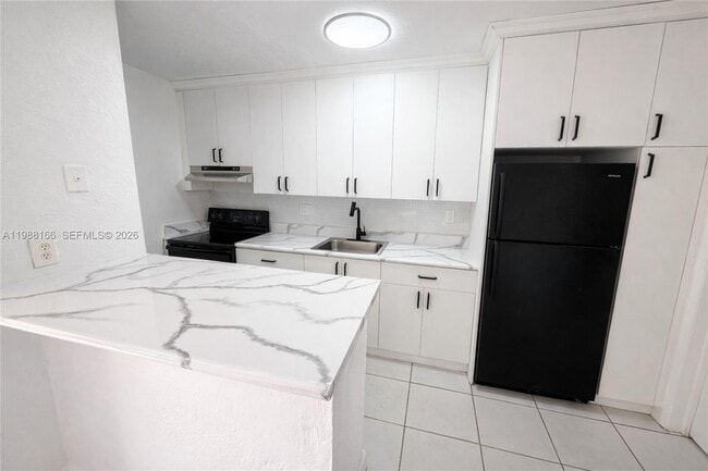 Building Photo - 4081 N Dixie Hwy