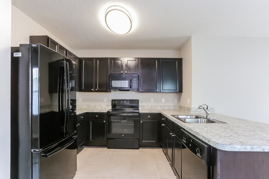 Building Photo - 12018 Suburban Sunrise St