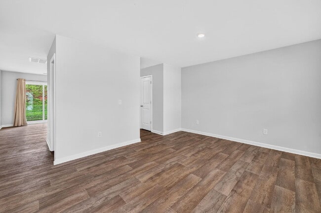 Building Photo - Experience Spacious Comfort: 3-Bedroom Home with 2.5 Baths.