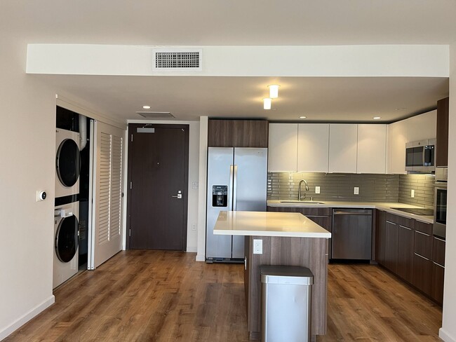 Building Photo - Symphony - 2 bedroom, 2 baths Condo, with 2 parking stalls - Avail now!