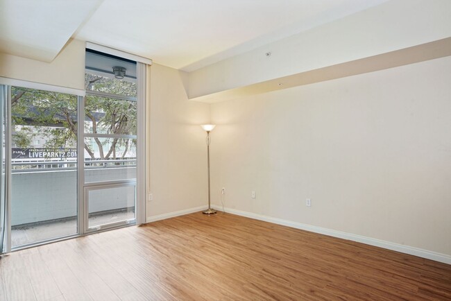 Building Photo - Gorgeous open, supersized 1/BR features a ...