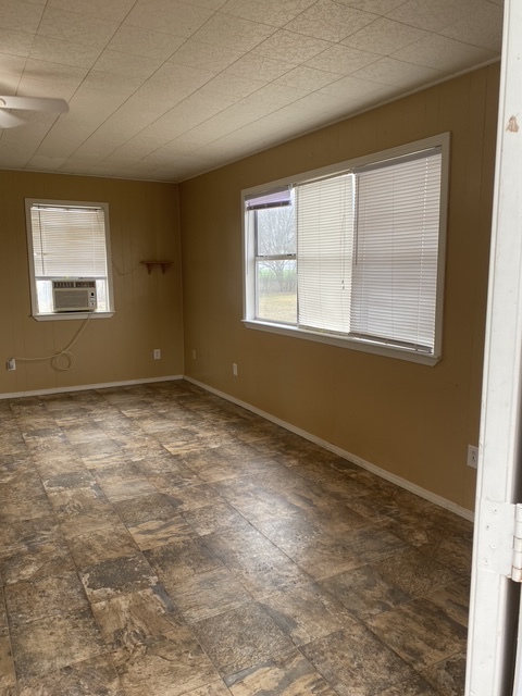Master bedroom windows look out into expnasive back yard - 16550 County Road 282
