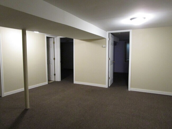 Building Photo - Privacy Fence and a Garage!