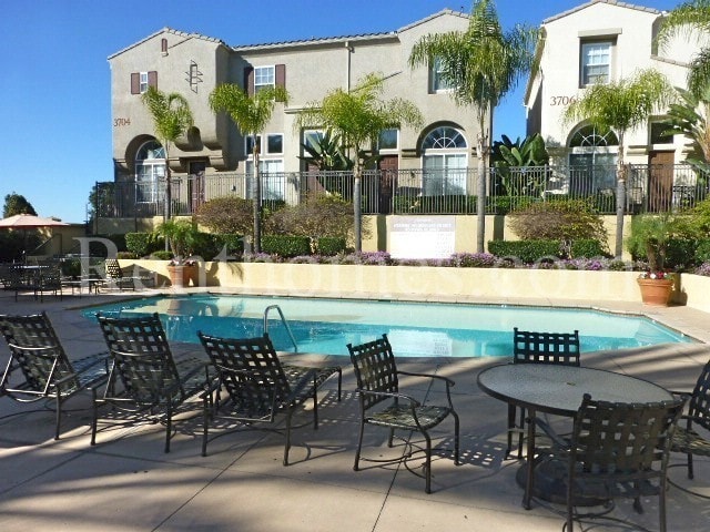 Building Photo - Carmel Valley, 3710 Mykonos Ln #171, AC, Granite Counters, Attached 2 Car Garage, Community Pool,...