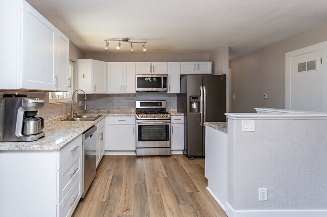 Building Photo - Charming 3BR Home with Updated Amenities &...