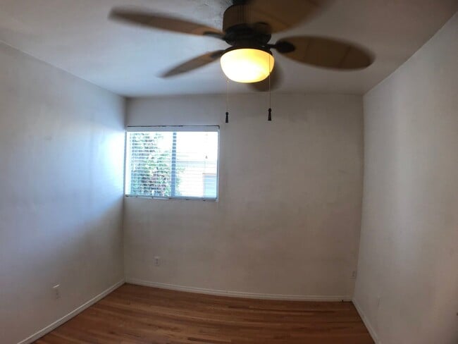 Building Photo - BEAUTIFUL WOOD FLOORS IN THIS- 5 BED 2 BATHROOM- Includes maid service