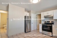 Building Photo - FREE 1ST MONTH'S RENT - Charming 2-bed Uni...