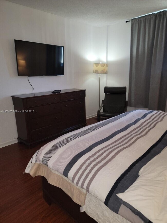 Building Photo - 19380 Collins Ave