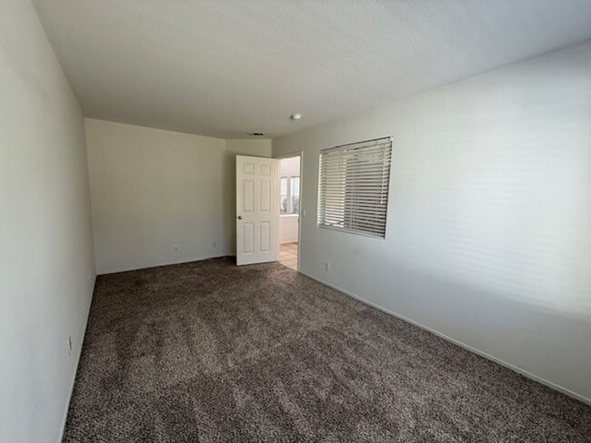 Building Photo - Welcome to Wagon Wheel – 4 Bed + Office | ...