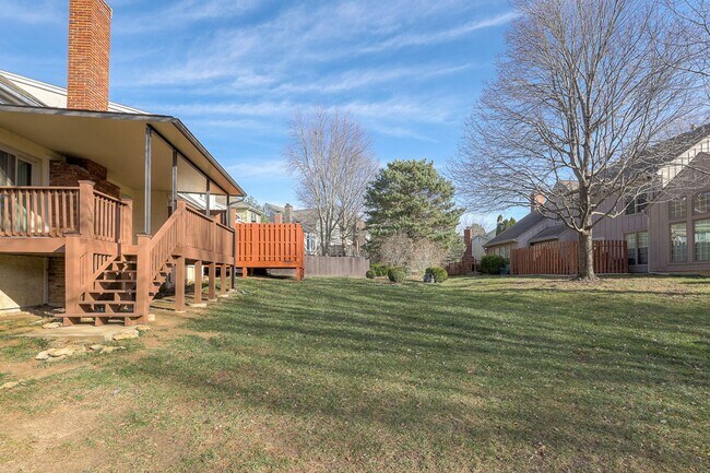 Building Photo - {11409} Updated Duplex in Fantastic Location + Two Car Garage + Main Level Master + Covered Deck