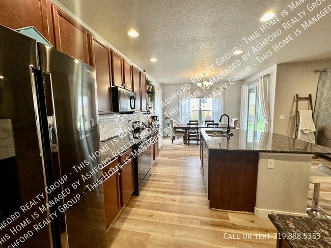 Building Photo - 7772 Wagonwood Pl