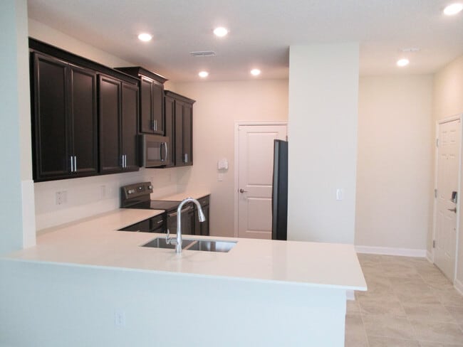 Building Photo - 3 Bedroom, 2.5 Bath, Recently Constructed Town Home in Sawgrass Plantation! Priced to Rent!