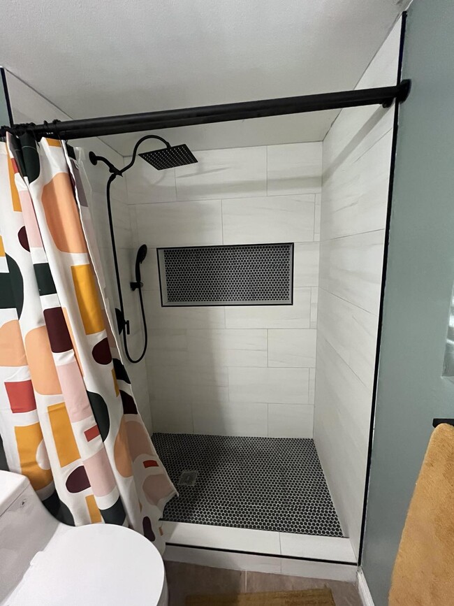 Updated master bath shower - 9440 N 52nd Ln