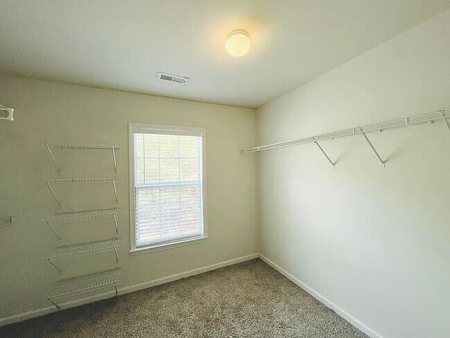 Building Photo - 4668 Creekside Villas Way