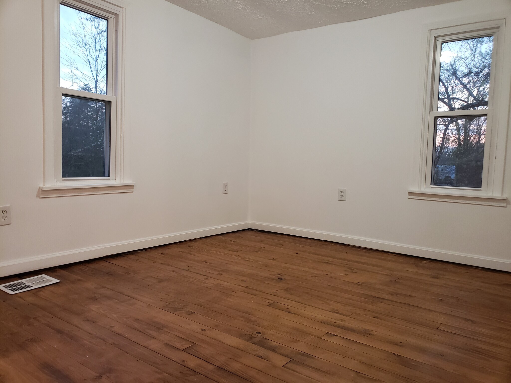 Second floor bedroom at the back of the house has refinished original hard wood floors. - 10106 Wingfield Rd