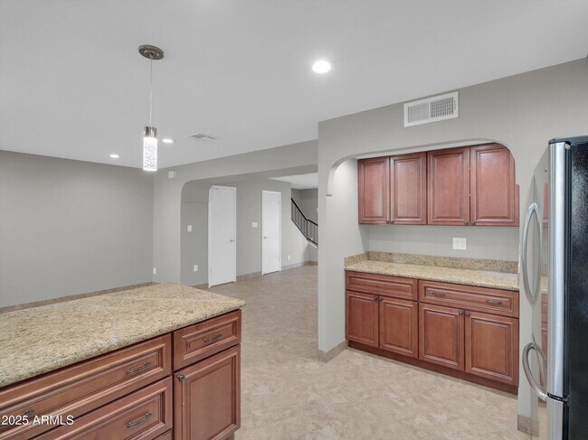 Building Photo - 8522 E Montebello Ave