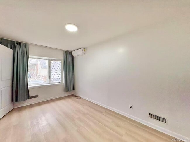 Building Photo - 23-47 128th St