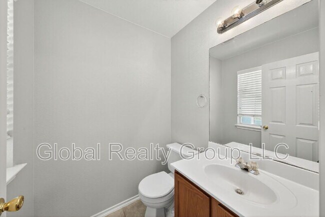 Building Photo - 10411 Artesia Wells